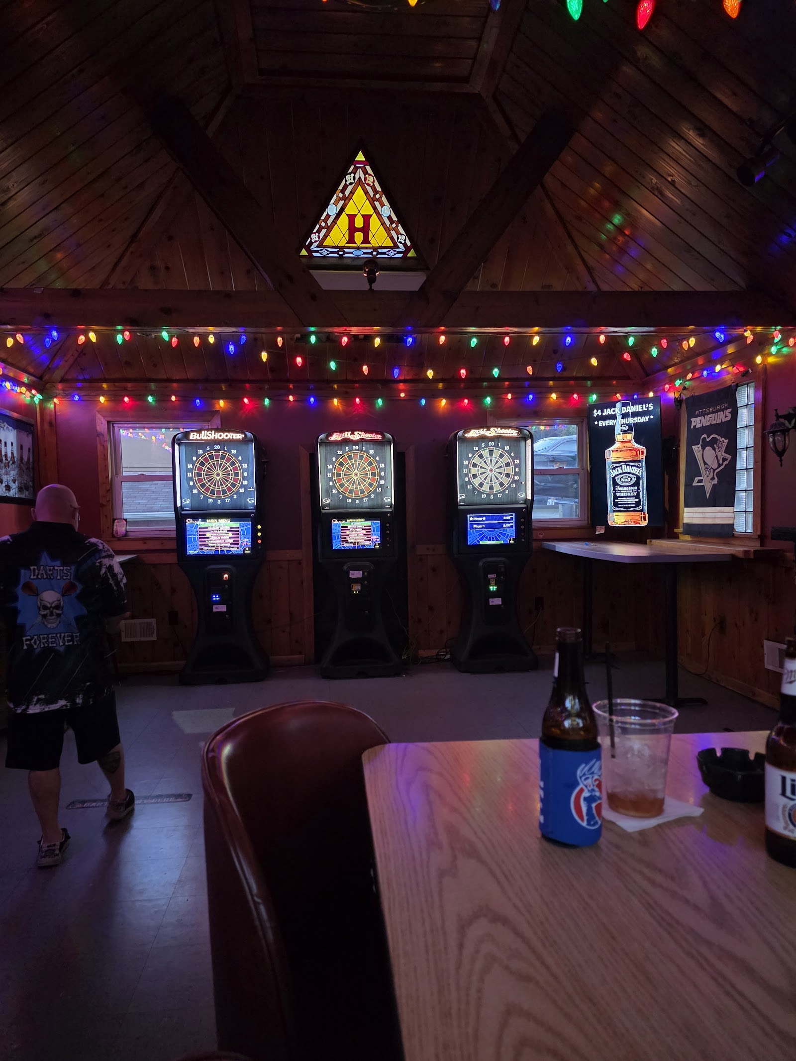 Dart machines and the stained-glass H