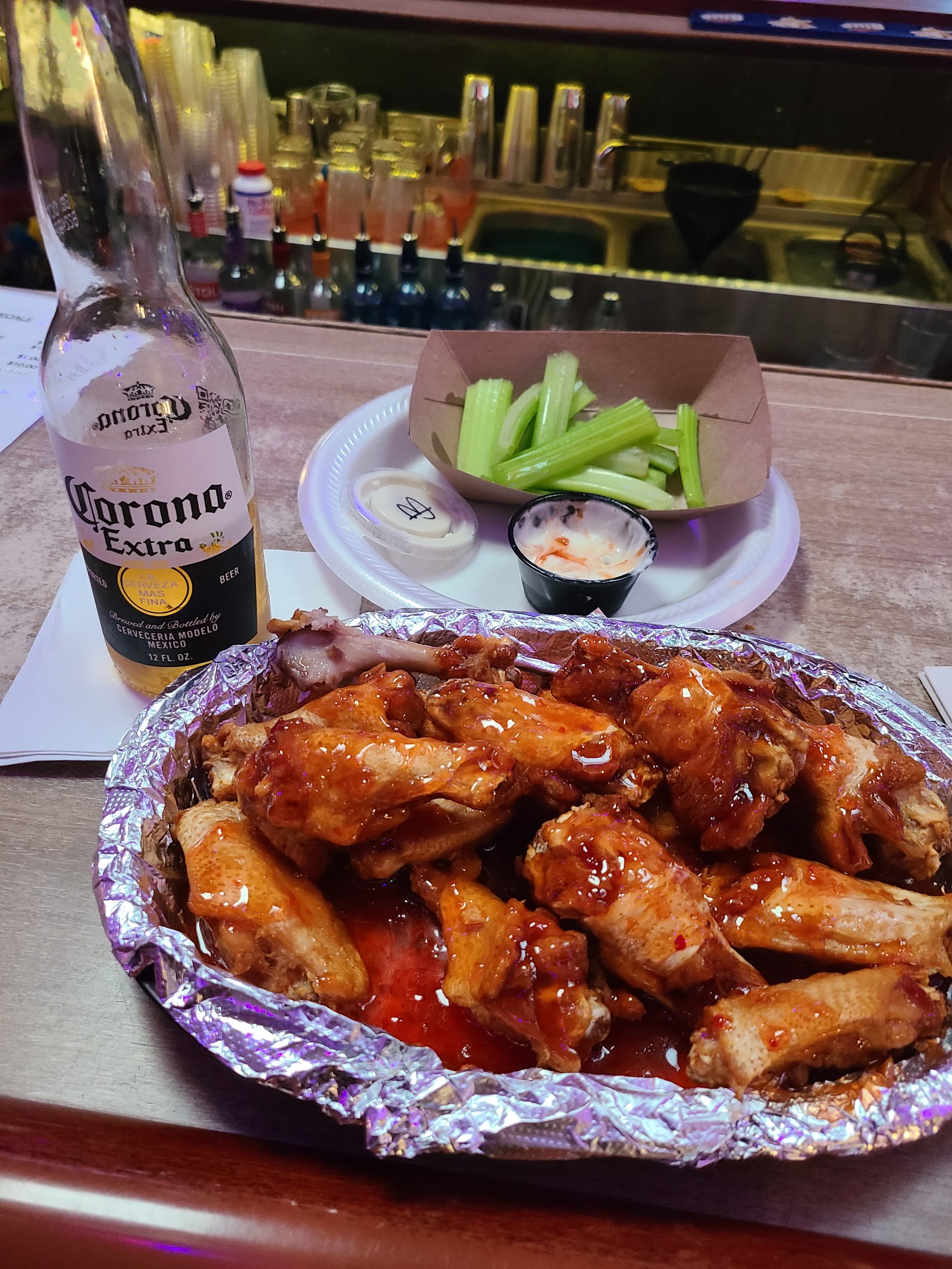Highland Bar wings with celery and a cold Corona